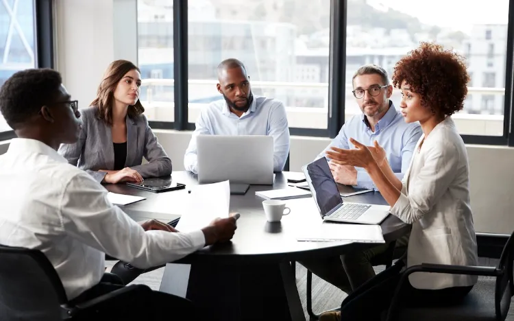 Business team discussing IT strategy and business goals.